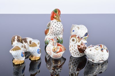 Lot 51 - Six modern Royal Crown Derby porcelain paperweights and a pair of small Vista Alegre baby pelicans