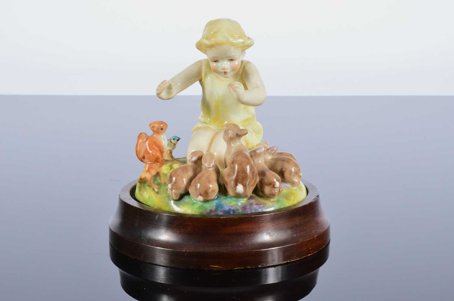 Lot 52 - A Royal Worcester porcelain Woodland Dance figural group by F.G. Doughty