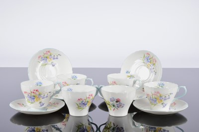 Lot 55 - A set of six Shelley porcelain Wild Flowers pattern tea cups and saucers