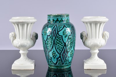 Lot 69 - A pair of Spanish pottery urns by Casasus