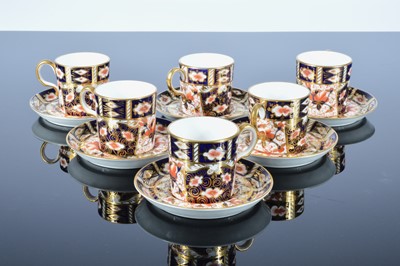 Lot 78 - A set of six Royal Crown Derby Imari style pattern coffee cans and saucers