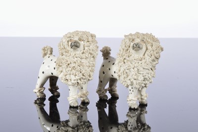 Lot 90 - Four pairs of Staffordshire animals