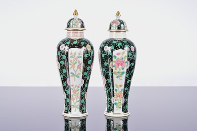 Lot 92 - A pair of Herend porcelain covered vases