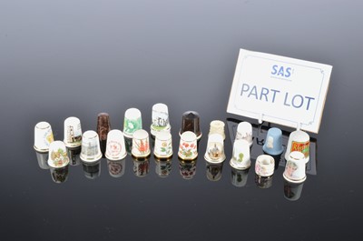 Lot 115 - A large collection of porcelain and other thimbles