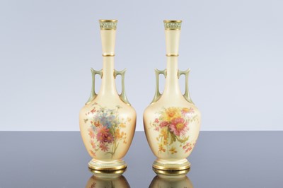 Lot 127 - A pair of Royal Worcester blush ivory porcelain vases