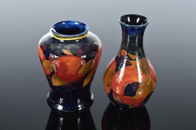 Lot 146 - Two Moorcroft Pottery Pomegranate and Berry pattern vases