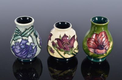 Lot 160 - Three small Moorcroft Pottery vases