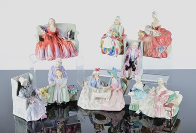 Lot 169 - Eight Royal Doulton seated figural groups