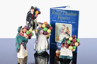 Lot 170 - Four Royal Doulton balloon related figures and a book