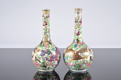 Lot 189 - A pair of Chinese porcelain bottle vases