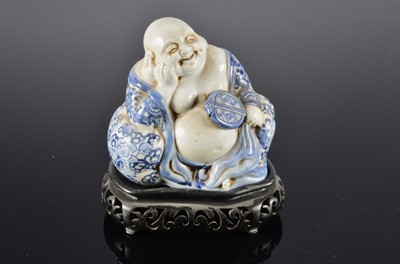 Lot 195 - A mid 20th century Chinese porcelain figure of Buddha