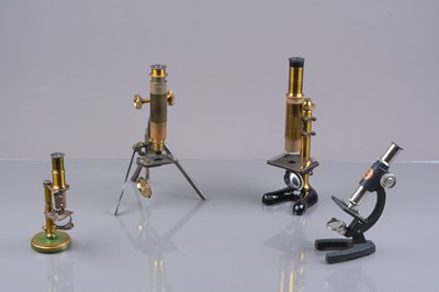 Lot 611 - Late 19th/early 20th Century brass draw-tube focusing Compound Monocular Microscopes