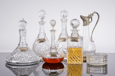 Lot 265 - Five glass decanters and a Claret jug