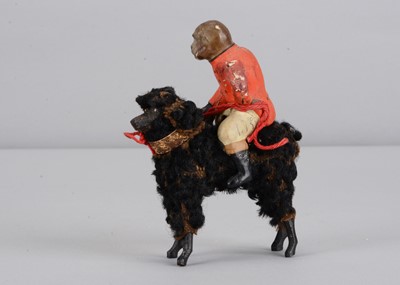 Lot 3 - A late 19th century German composition monkey riding a poodle candy container