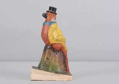 Lot 9 - A late 19th century Thüringen red bird squeak toy