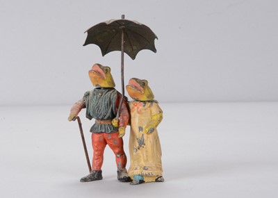 Lot 15 - A late 19th or early 20th century Heyde-type lead frog couple nodder