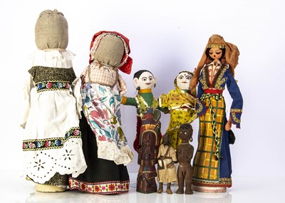 Lot 221 - Fourteen dolls from around the world