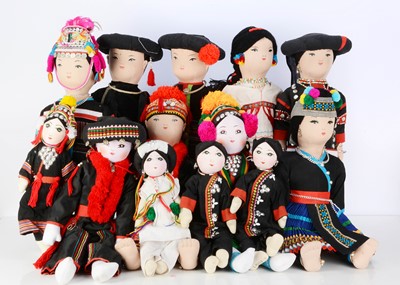Lot 221 - Fourteen dolls from around the world