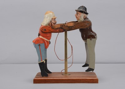 Lot 30 - An Albin Amende Sonneberg Kitchener and Kruger wresting toy, circa 1900