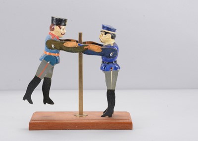 Lot 31 - An Albin Amende Sonneberg Russian and Japanese wresting toy, circa 1905