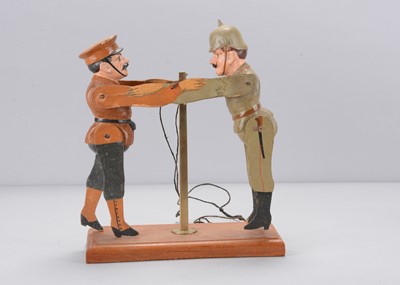 Lot 36 - An Albin Amende Sonneberg German 95th Division and Russian military wresting toy, circa 1917