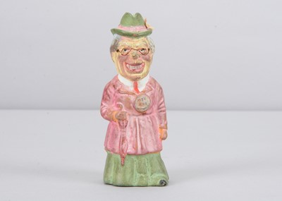 Lot 39 - An early 20th century German composition figure of a comic Suffragette