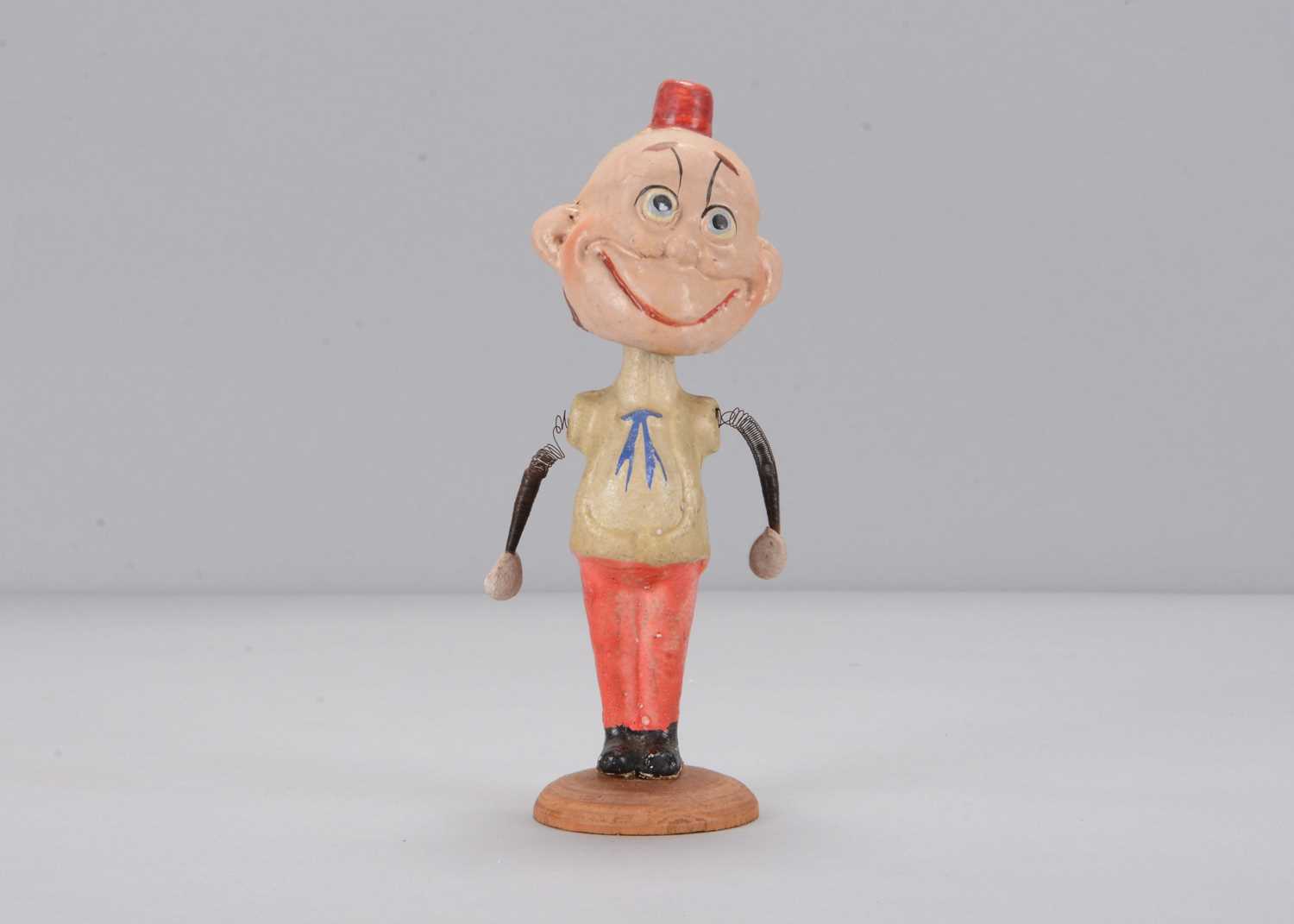 Lot 60 - An early 20th century German composition Happy Hooligan bobble-head toy