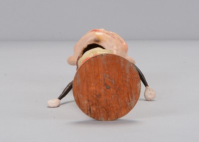Lot 60 - An early 20th century German composition Happy Hooligan bobble-head toy