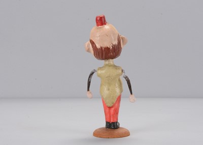 Lot 60 - An early 20th century German composition Happy Hooligan bobble-head toy