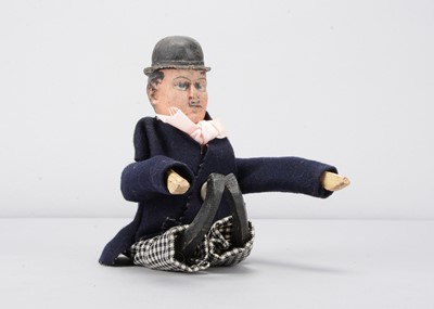 Lot 64 - An early 20th century German composition headed Charlie Chaplin clockwork tumbling toy