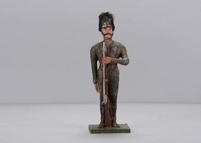 Lot 72 - A mid to late 19th century papier-mâché soldier