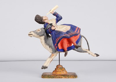 Lot 73 - A mid 19th century Thüringen composition Vivandière reclining drunkenly on the back of  galloping donkey