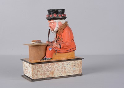 Lot 74 - A mid to late 19th century Thüringen Yeomen of the Guard (Beefeater) eating a sausage crank handled ‘eater’