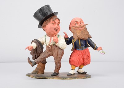 Lot 81 - A mid 19th century Thüringen drunken gentleman being recruited by a Zouave veteran nodders