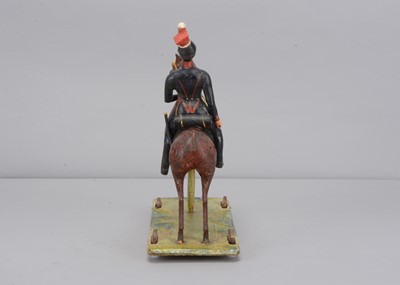 Lot 83 - A second quarter of 19th century Thüringen composition Soldier on horse pull along toy