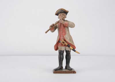 Lot 92 - A late 18th or early 19th century German carved wooden 18th century Prussian military flautist