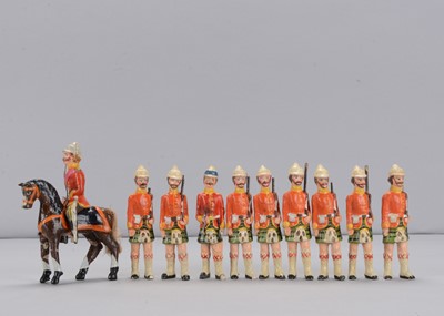 Lot 100 - Nine late 19th century composition Highland infantrymen