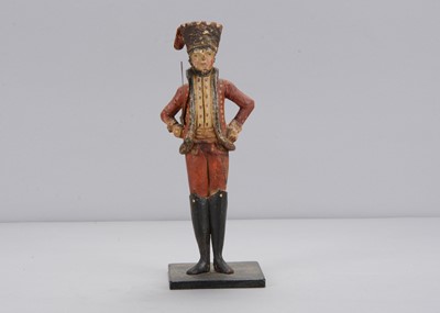 Lot 102 - A large early 19th century carved wooden Grödnertal Hussar toy soldier