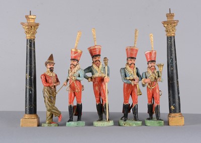 Lot 105 - Four mid 19th century wooden Hussar bandsmen