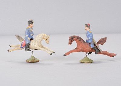 Lot 107 - Two late 19th century Seiffen/Olbernhau composition German cavalry on springs