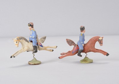 Lot 107 - Two late 19th century Seiffen/Olbernhau composition German cavalry on springs