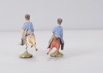 Lot 107 - Two late 19th century Seiffen/Olbernhau composition German cavalry on springs