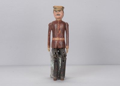 Lot 108 - A late 19th century wooden folk art soldier jigger