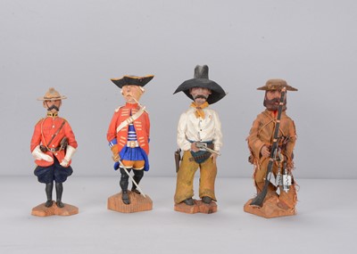 Lot 112 - Four recent carved wooden 19th century characters by G Walker