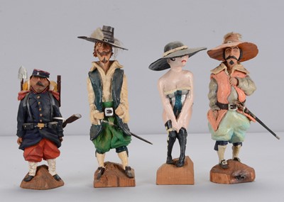 Lot 113 - Four recent carved wooden 19th century characters by G Walker