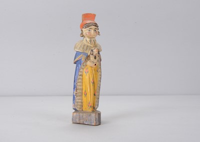 Lot 115 - A Sergiev Posad  19th century trihedrial doll with dog