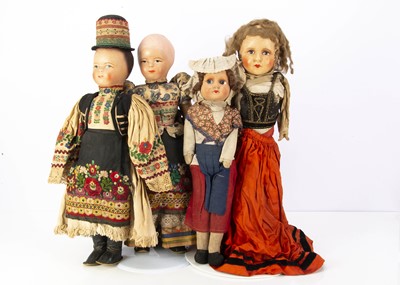 Lot 222 - A large quantity of European costume dolls