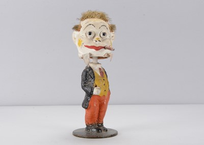 Lot 137 - An early 20th century composition clown nodder