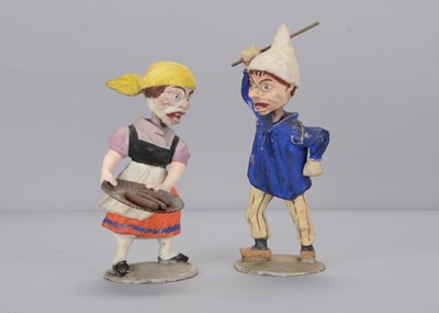 Lot 138 - A pair of late 19th century Thüringen ugly arguing   nodders