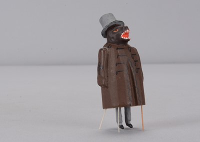 Lot 145 - A late 19th century German bristle toy of a bear in coat and top hat